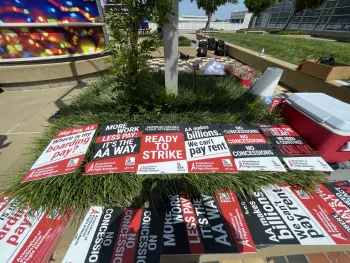 Signs from the APFA Picket